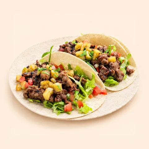 Al pastor tacos with pineapple